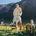 SWT0192_INARIA-W-1.4-PRD-FLEECE_SUMMIT-BOUQUET-PRINT_A + WSH0118_PARUMA-TECH-SHORT_CLOUDY-BLUE_A_01.webp